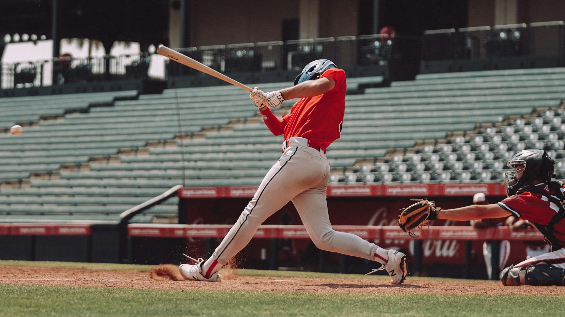 College baseball player swinging for the ball